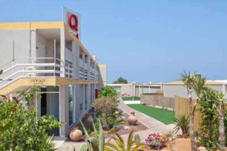 Q Hotel Village